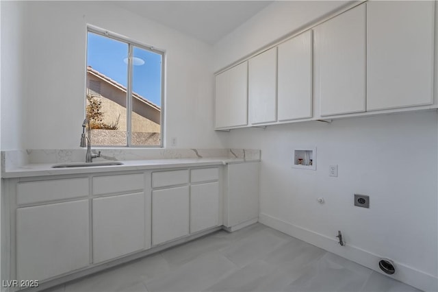 1316 Eagle Meadow Ct, Las Vegas, NV 89123 - laundry room with hookup for a gas dryer, washer hookup, electric dryer hookup, cabinet space, and baseboards