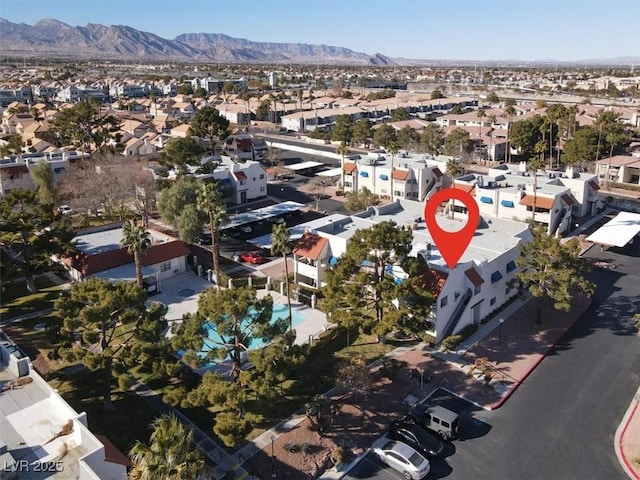 aerial overview of property's location featuring nearby suburban area and mountains