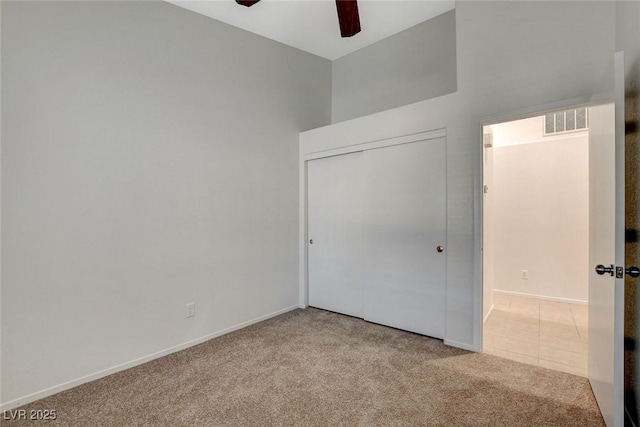 832 Seco Verde Ave, Henderson, NV 89015 - unfurnished bedroom with carpet floors, a closet, baseboards, and a ceiling fan