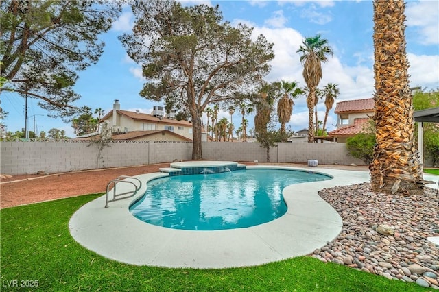 view of pool with a fenced backyard