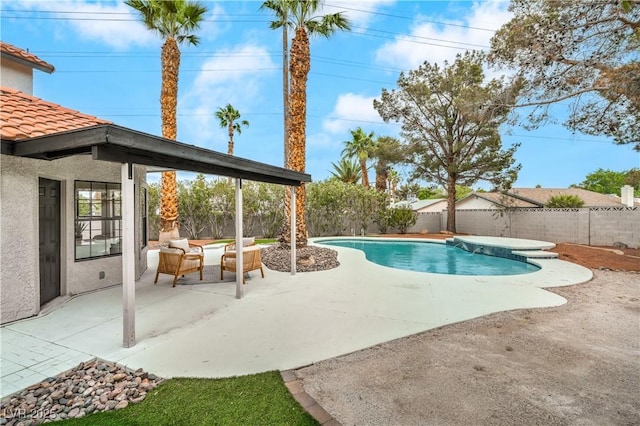 view of swimming pool with a fenced backyard, a patio area, and outdoor lounge area