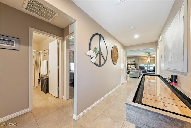 3966 E Garfield Dr, Pahrump, NV 89061 - hall with light tile patterned floors, baseboards, and recessed lighting