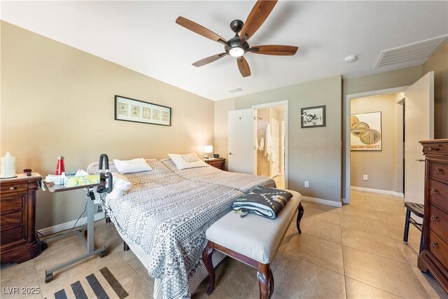 3966 E Garfield Dr, Pahrump, NV 89061 - bedroom with baseboards, ceiling fan, and light tile patterned floors