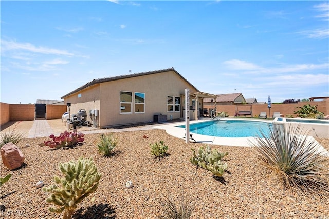 3966 E Garfield Dr, Pahrump, NV 89061 - view of swimming pool featuring a fenced backyard and a patio