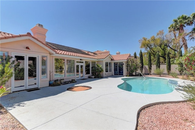 8300 Slate Harbor Cir, Las Vegas, NV 89128 - view of pool featuring french doors, a patio, and fence