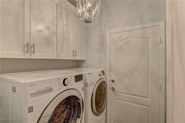 8300 Slate Harbor Cir, Las Vegas, NV 89128 - laundry room featuring independent washer and dryer, cabinet space, and a chandelier