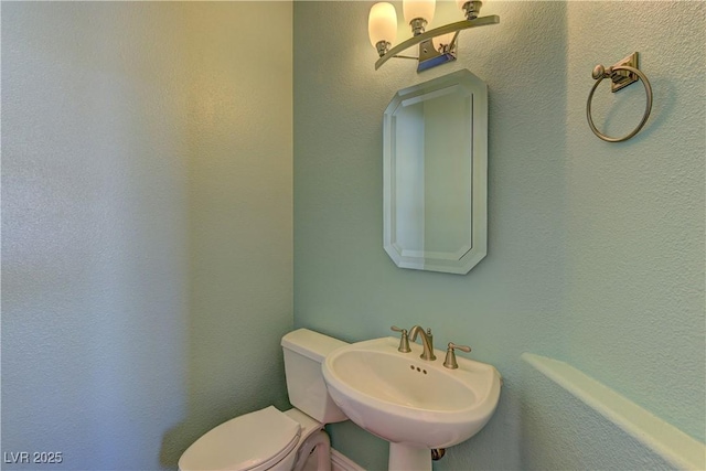 8300 Slate Harbor Cir, Las Vegas, NV 89128 - bathroom with a sink and toilet