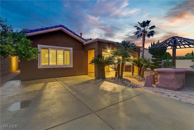 936 Viscanio Pl, Las Vegas, NV 89138 - view of front facade featuring stucco siding and a patio