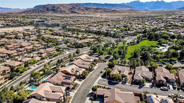 aerial perspective of suburban area featuring a mountain backdrop