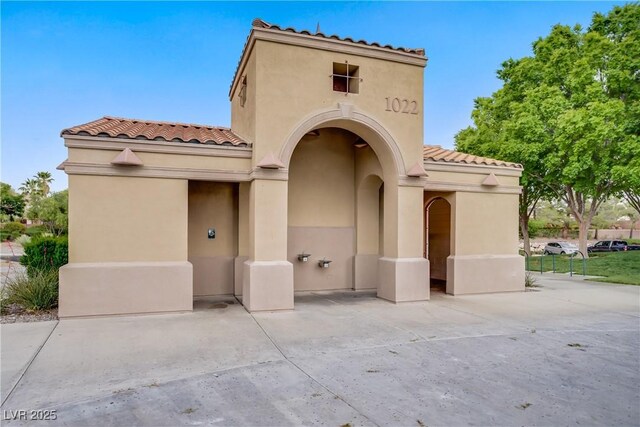 936 Viscanio Pl, Las Vegas, NV 89138 - view of front of property featuring a tiled roof and stucco siding