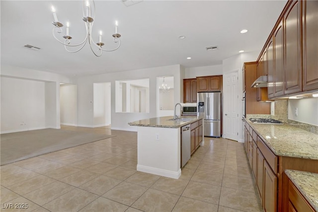 kitchen featuring stainless steel appliances, a chandelier, light tile patterned floors, an island with sink, and recessed lighting