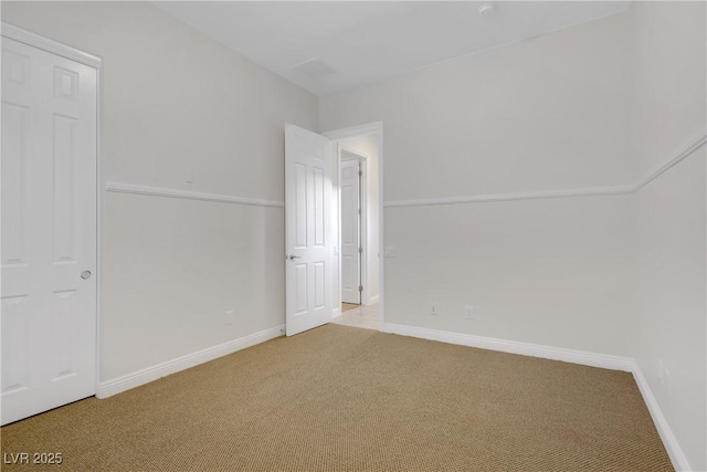 bonus room with carpet flooring and baseboards