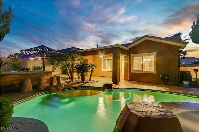 swimming pool with a patio