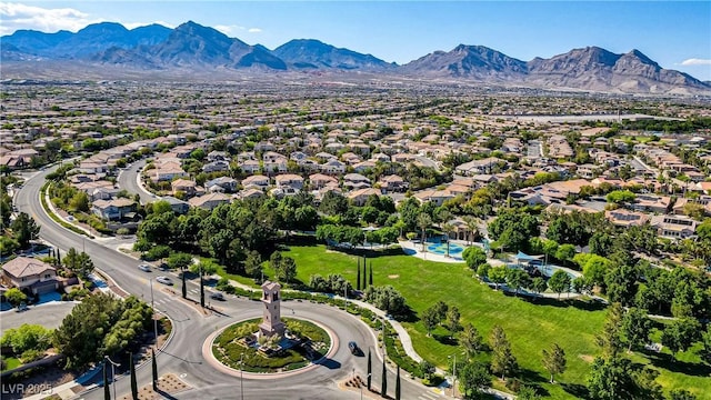 aerial view of residential area with a mountainous background
