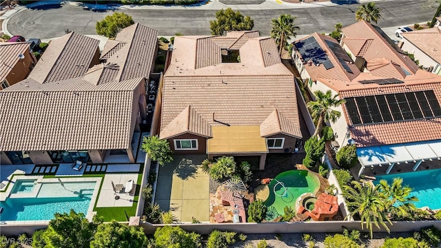 drone / aerial view of a pool area