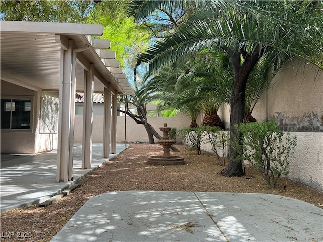 2855 Grande Valley Dr, Las Vegas, NV 89135 - view of yard featuring a patio and fence