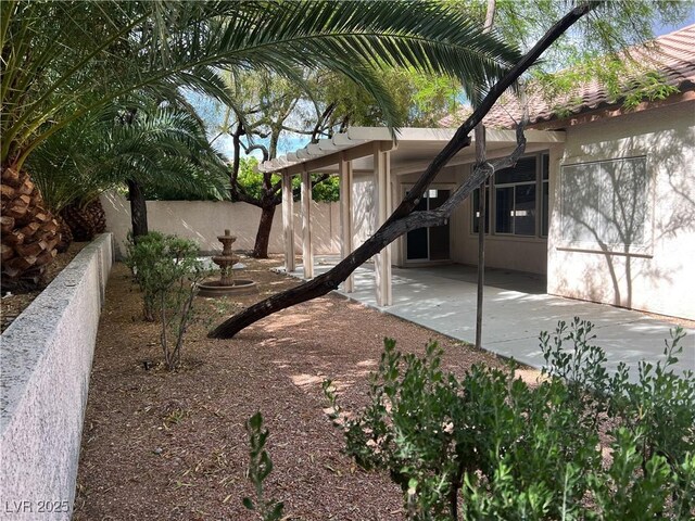 2855 Grande Valley Dr, Las Vegas, NV 89135 - view of yard featuring a patio and fence