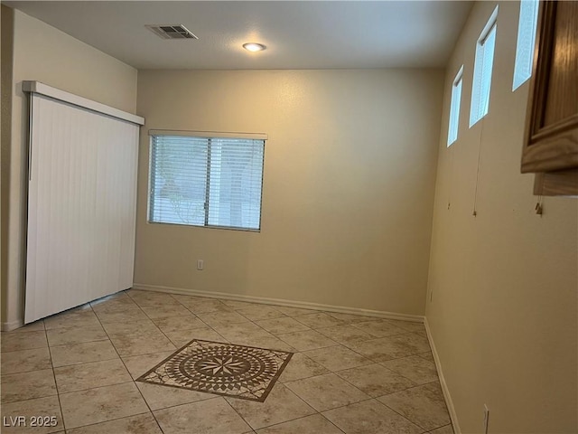2855 Grande Valley Dr, Las Vegas, NV 89135 - empty room featuring light tile patterned floors and baseboards