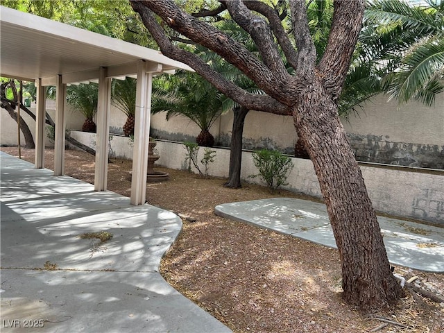 2855 Grande Valley Dr, Las Vegas, NV 89135 - view of yard featuring a patio area and fence