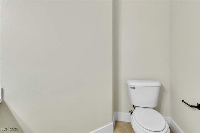 11621 La Mirago Pl, Las Vegas, NV 89138 - bathroom with baseboards, toilet, and tile patterned flooring