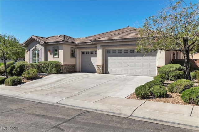 11621 La Mirago Pl, Las Vegas, NV 89138 - single story home featuring a garage, driveway, stucco siding, and a tiled roof