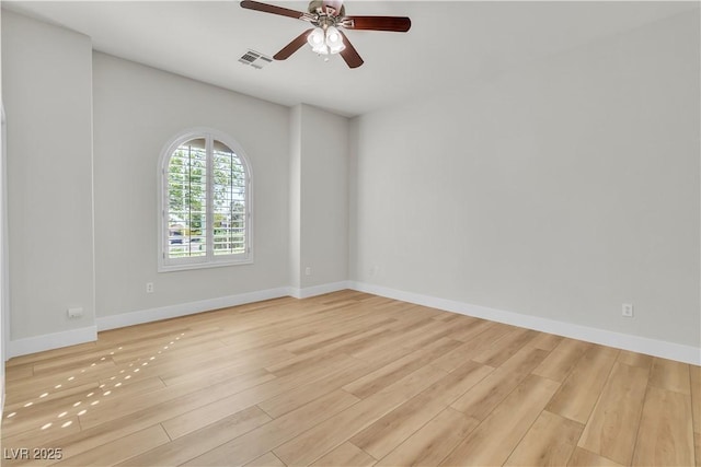 11621 La Mirago Pl, Las Vegas, NV 89138 - unfurnished room featuring light wood-style flooring, a ceiling fan, and baseboards