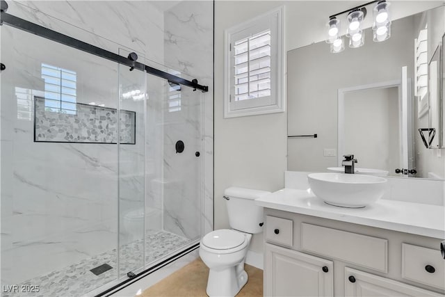 11621 La Mirago Pl, Las Vegas, NV 89138 - bathroom with a marble finish shower, toilet, and vanity