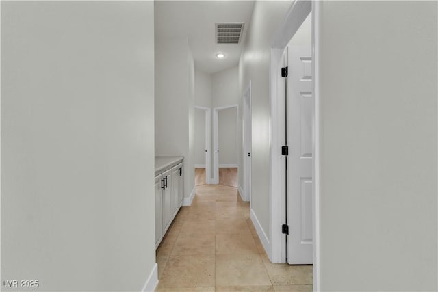 11621 La Mirago Pl, Las Vegas, NV 89138 - hallway with light tile patterned floors, baseboards, and recessed lighting