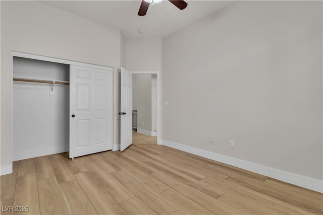 11621 La Mirago Pl, Las Vegas, NV 89138 - unfurnished bedroom featuring light wood-style floors, baseboards, a closet, and a ceiling fan