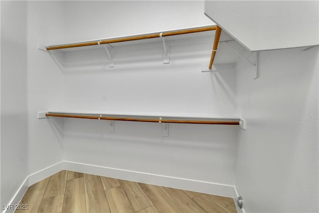 11621 La Mirago Pl, Las Vegas, NV 89138 - spacious closet with light wood-style floors