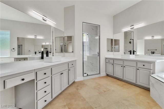 11621 La Mirago Pl, Las Vegas, NV 89138 - full bathroom featuring a stall shower and two vanities