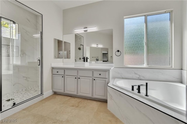 11621 La Mirago Pl, Las Vegas, NV 89138 - bathroom featuring a marble finish shower, a bath, vanity, and tile patterned flooring