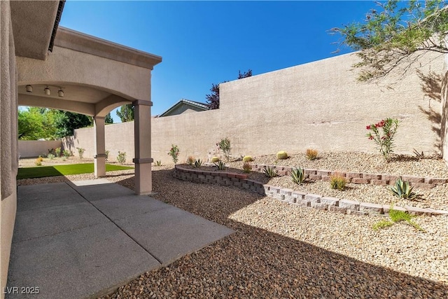 11621 La Mirago Pl, Las Vegas, NV 89138 - fenced backyard with a patio