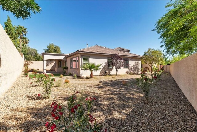 11621 La Mirago Pl, Las Vegas, NV 89138 - view of side of property featuring a fenced backyard and stucco siding