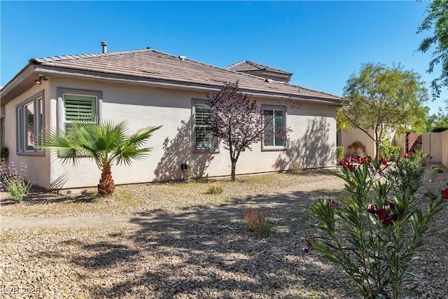 11621 La Mirago Pl, Las Vegas, NV 89138 - view of side of home with fence and stucco siding