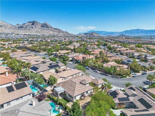11621 La Mirago Pl, Las Vegas, NV 89138 - aerial perspective of suburban area featuring mountains and a pool area