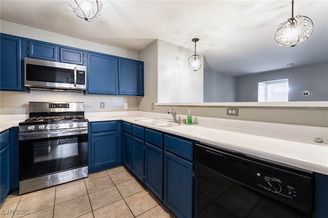 350 S Durango Dr Unit 108, Las Vegas, NV 89145 - kitchen featuring appliances with stainless steel finishes, a sink, and blue cabinets