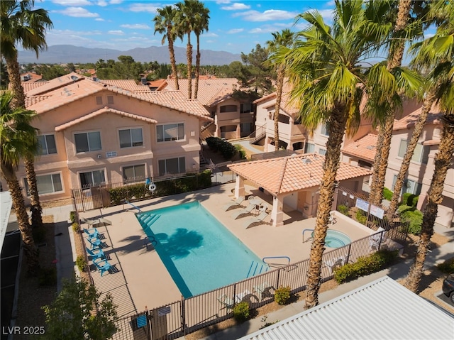 350 S Durango Dr Unit 108, Las Vegas, NV 89145 - community pool featuring a mountain view and a patio