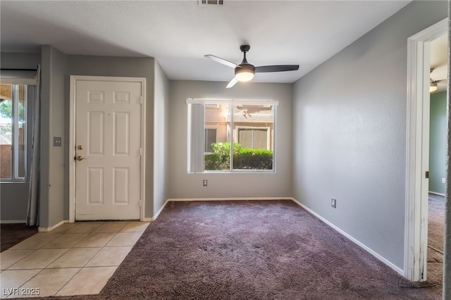 350 S Durango Dr Unit 108, Las Vegas, NV 89145 - entrance foyer featuring ceiling fan, baseboards, and light carpet