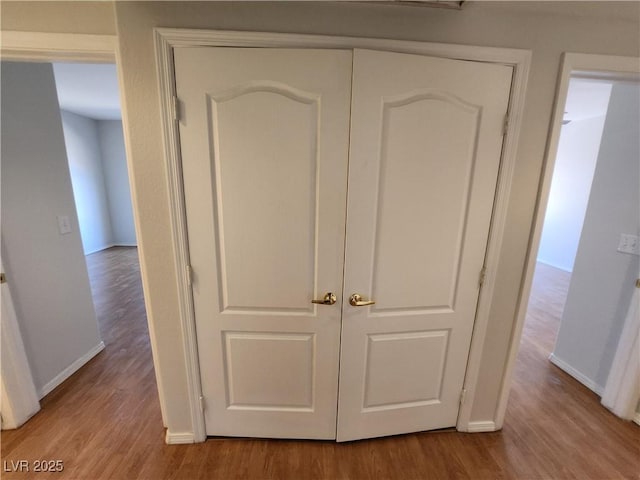 detailed view of wood finished floors and baseboards