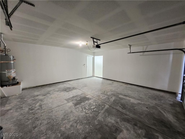 garage featuring secured water heater and a garage door opener