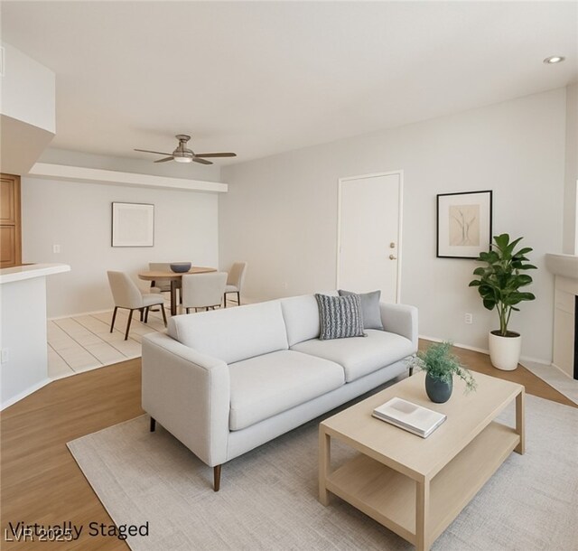 6908 Dorita Ave Unit 101, Las Vegas, NV 89108 - living area with a ceiling fan, light wood finished floors, and recessed lighting