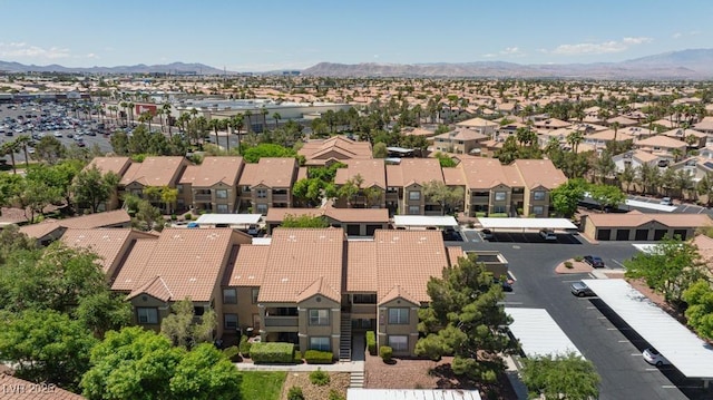 aerial view of residential area with mountains