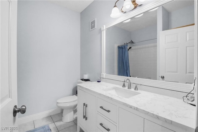 bathroom featuring toilet, vanity, curtained shower, baseboards, and tile patterned floors