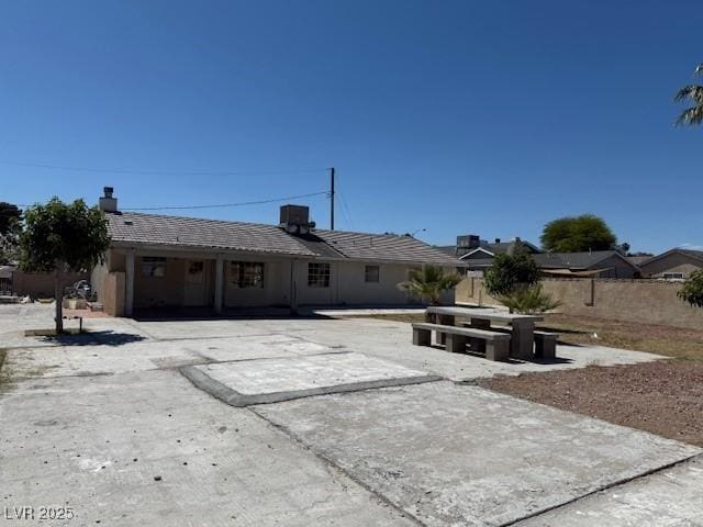 view of front of home with fence