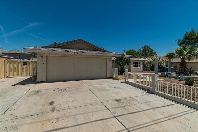 5170 S Pearl St, Las Vegas, NV 89120 - single story home featuring driveway, an attached garage, and stucco siding
