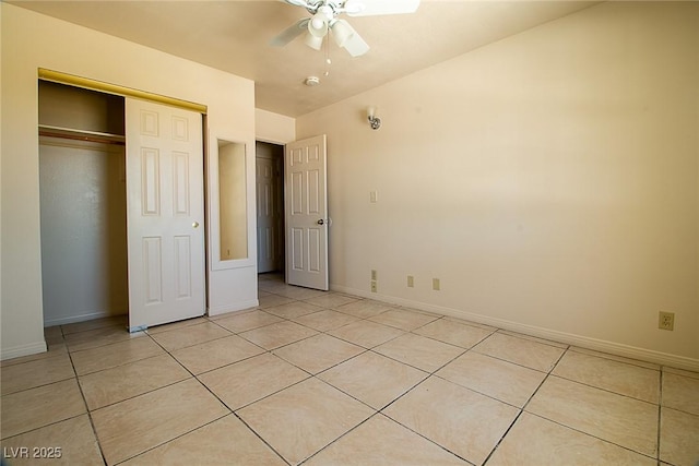 5170 S Pearl St, Las Vegas, NV 89120 - unfurnished bedroom featuring a closet, light tile patterned flooring, baseboards, and a ceiling fan