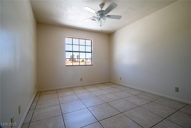 5170 S Pearl St, Las Vegas, NV 89120 - empty room featuring a ceiling fan, light tile patterned floors, and baseboards