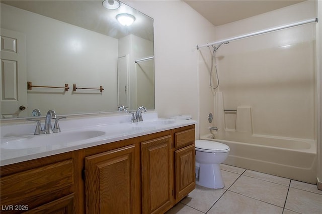 5170 S Pearl St, Las Vegas, NV 89120 - full bath with tile patterned floors, double vanity, toilet, and tub / shower combination