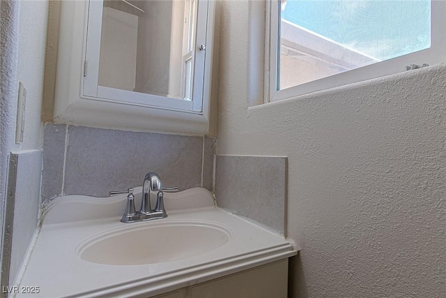 5170 S Pearl St, Las Vegas, NV 89120 - bathroom with a textured wall and vanity